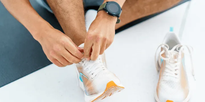 man wearing a pair of clean white sneakers