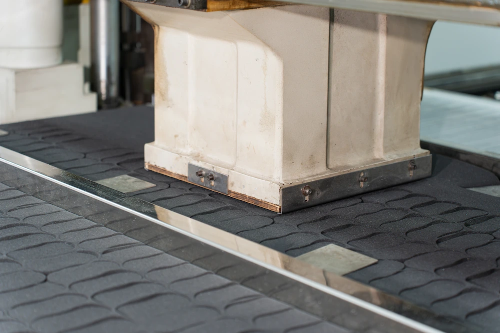 cutting shoe sponges to the desired size using automated cutting machines