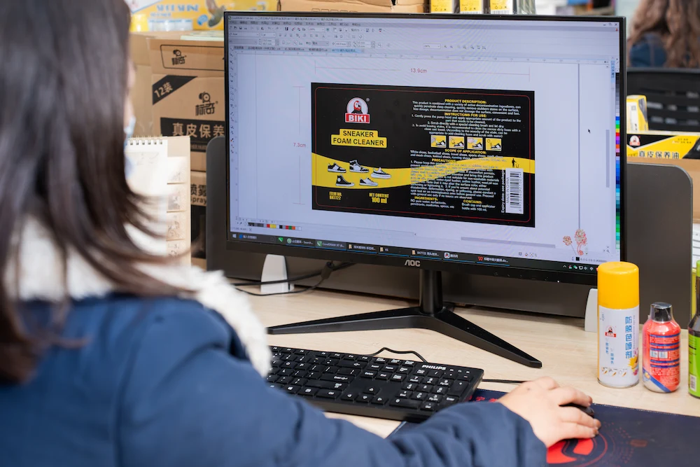digital artist checking the marketing materials created to showcase your shoe cleaning products