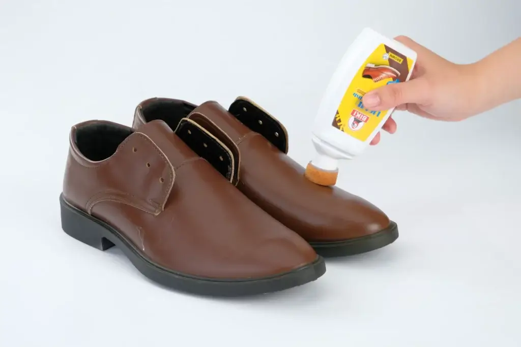 Using Biki Brown Liquid Shoe Polish on Brown Leather Shoes for Maintenance