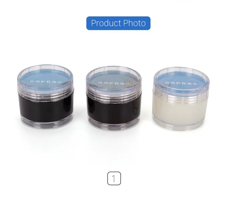 Three closed jars of solid leather shoe polish arranged side-by-side in black, brown, and neutral cream colors.